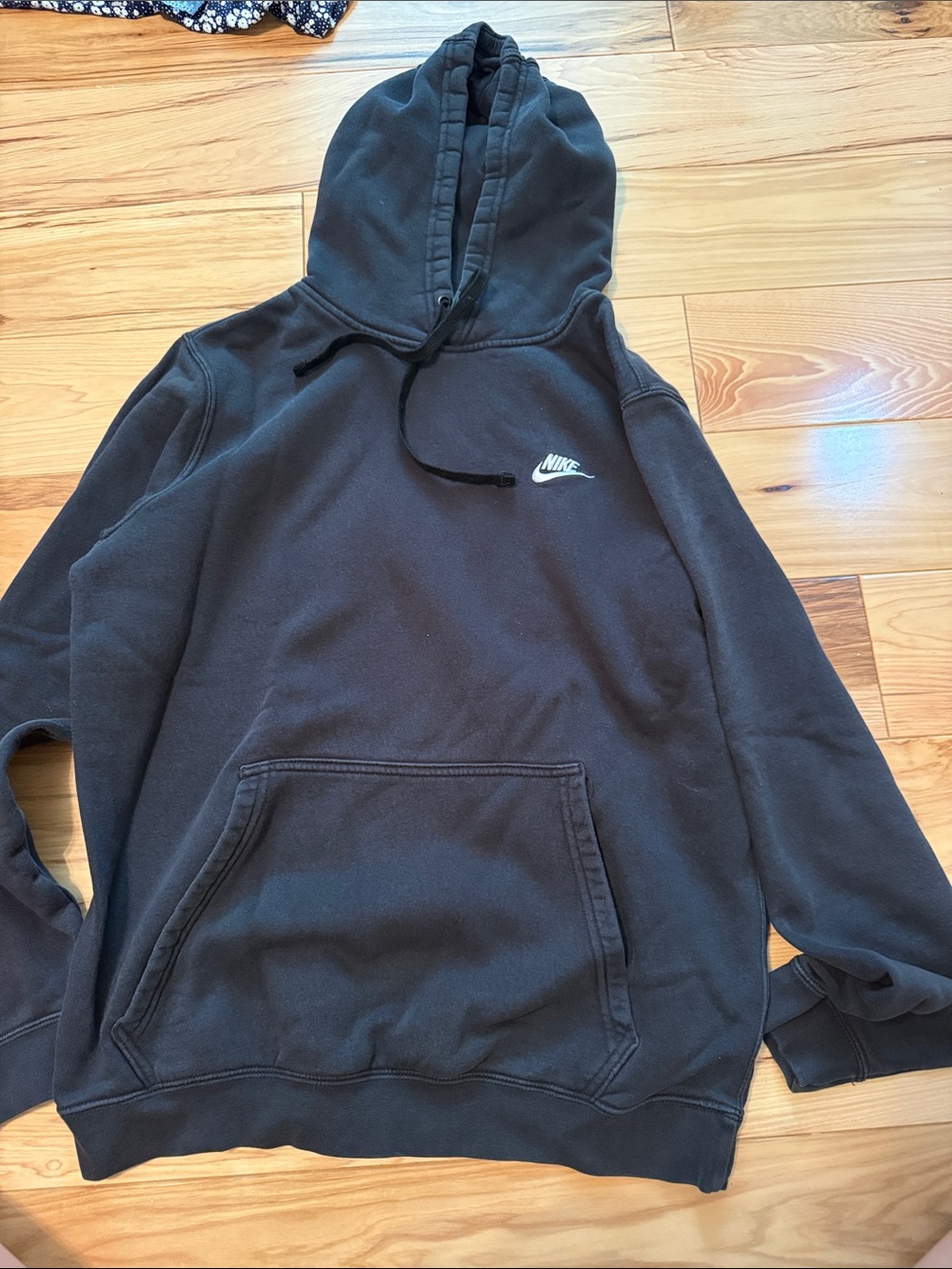 Nike Black Hoodie with White Swoosh Logo
